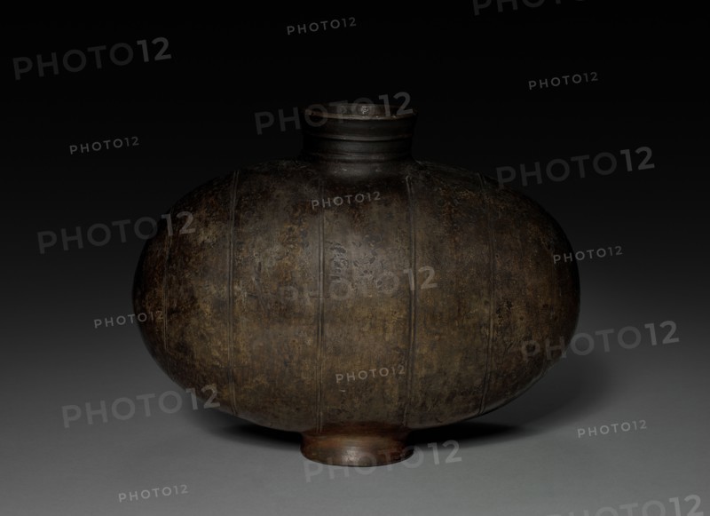 Cocoon Flask, 206 BC - AD 9. China, Western Han dynasty (202 BC-AD 9). Earthenware; diameter of mouth: 9.3 cm (3 11/16 in.); overall: 26.4 x 34.8 cm (10 3/8 x 13 11/16 in.).