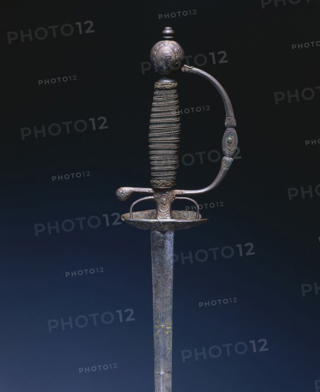 Small Sword, c. 1750-1770. France, Paris, 18th century. Steel, gilded with wood; overall: 103.2 cm (40 5/8 in.); blade: 86 cm (33 7/8 in.); guard: 7 cm (2 3/4 in.)