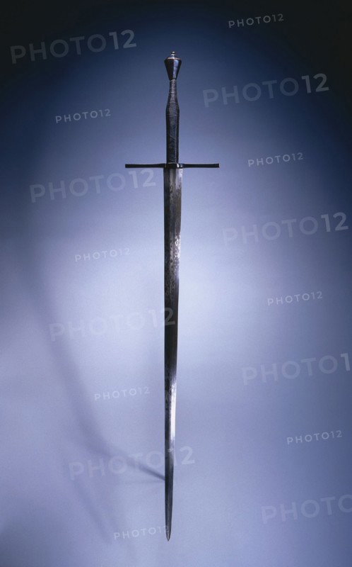 Hand-and-a-Half Sword, c. 1550. Germany, mid-16th century. Steel, blued pommel and quillions, leather grip; overall: 123.9 cm (48 3/4 in.); blade: 92.3 cm (36 5/16 in.); quillions: 24.8 cm (9 3/4 in.); grip: 30.5 cm (12 in.)