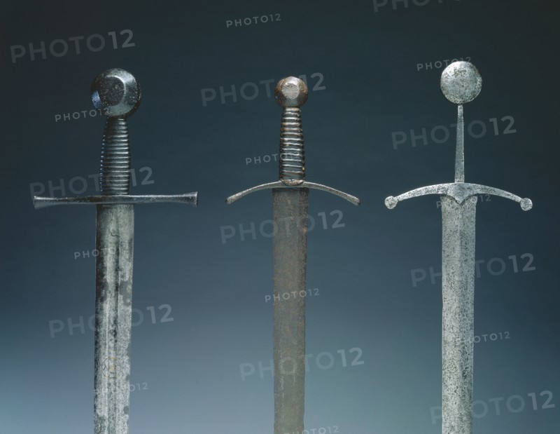 Sword, 1400s. Germany (?), 15th century. Steel; wood and leather grip; overall: 104.2 cm (41 in.); blade: 87.3 cm (34 3/8 in.); quillions: 20.3 cm (8 in.).