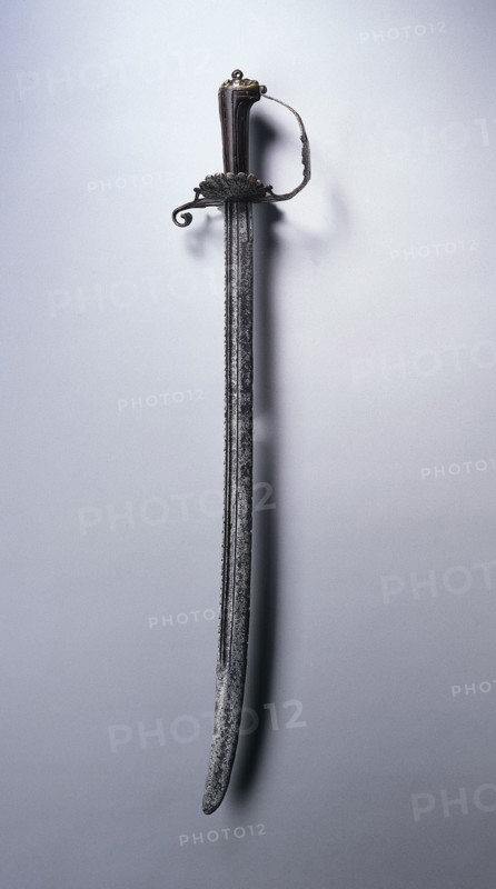 Hunting Sword, c. 1700. Netherlands, early 18th Century. Steel, wood, brass; overall: 81.3 cm (32 in.); blade: 66.7 cm (26 1/4 in.); guard: 16.2 cm (6 3/8 in.).