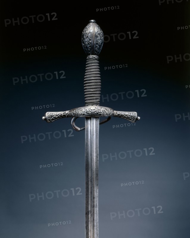Rapier, c. 1600. Italy, early 17th Century. Steel, wire grip; hilt blued and chiseled with foliate pattern; overall: 110 cm (43 5/16 in.); blade: 94 cm (37 in.); quillions: 16.2 cm (6 3/8 in.); grip: 14.7 cm (5 13/16 in.)