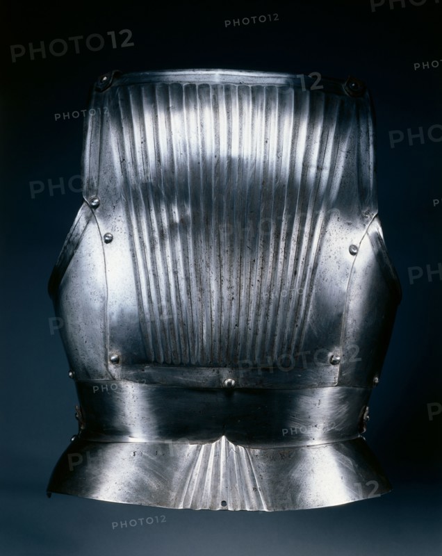 Backplate in the Maximilian Style, c.1510-1530. Germany, Nuremberg(?), early 16th century. Steel, brass rivets; overall: 42 x 33.9 x 15.5 cm (16 9/16 x 13 3/8 x 6 1/8 in.).