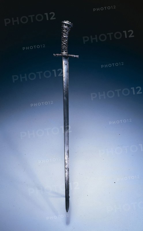 Hunting Sword, c. 1760-1770. Netherlands, 18th century. Steel; pierced and chiseled cast-iron hilt ; blade engraved; overall: 65 cm (25 9/16 in.); blade: 52.9 cm (20 13/16 in.); quillions: 8.9 cm (3 1/2 in.); grip: 11.6 cm (4 9/16 in.).