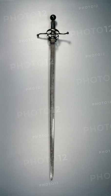 Rapier, c. 1610. Germany, early 17th Century. Steel; hilt of deeply blued steel; wood; overall: 125.2 cm (49 5/16 in.); blade: 110 cm (43 5/16 in.); quillions: 25 cm (9 13/16 in.); grip: 13.5 cm (5 5/16 in.).