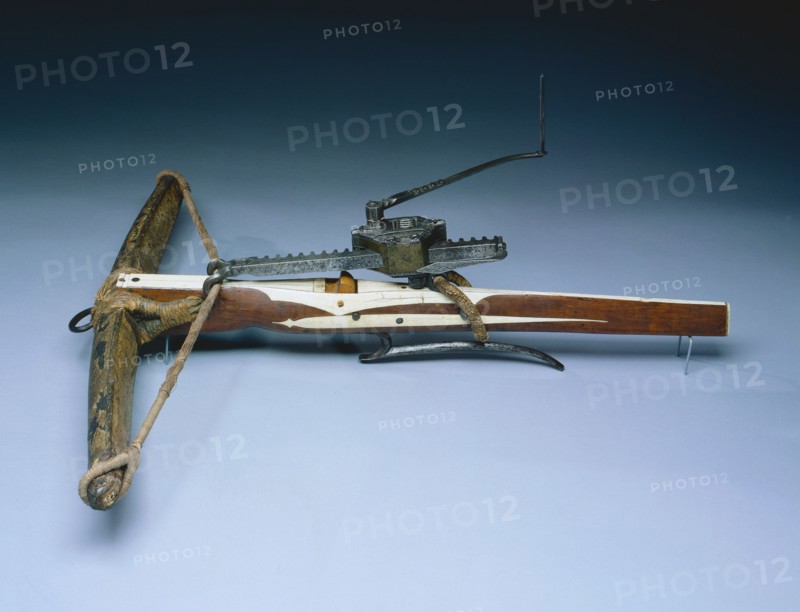 Crossbow, c. 1460-1470. Germany, 15th century. Wood (walnut?) inlaid with bone; horn; iron and steel; composite bow (horn and parchment); overall: 87 cm (34 1/4 in.); bow: 74.5 cm (29 5/16 in.); butt: 4.2 cm (1 5/8 in.).