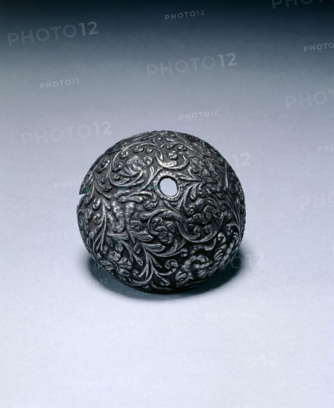 Butt-Cap from a Flintlock Pistol, c. 1650-1660. Italy, Brescia, 17th century. Steel, chiseled; diameter: 4.8 cm (1 7/8 in.); overall: 1.9 cm (3/4 in.).