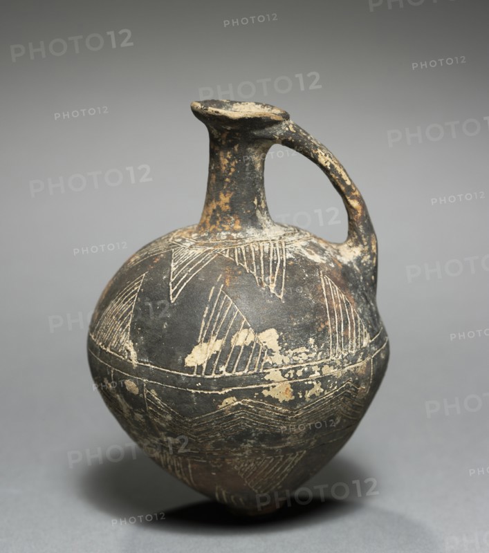 Jug, c. 1600-1450 BC. Cyprus, Late Cypriot I. Black-glazed earthenware; diameter: 6.7 cm (2 5/8 in.); overall: 9.5 cm (3 3/4 in.); diameter of lid: 2.1 cm (13/16 in.).