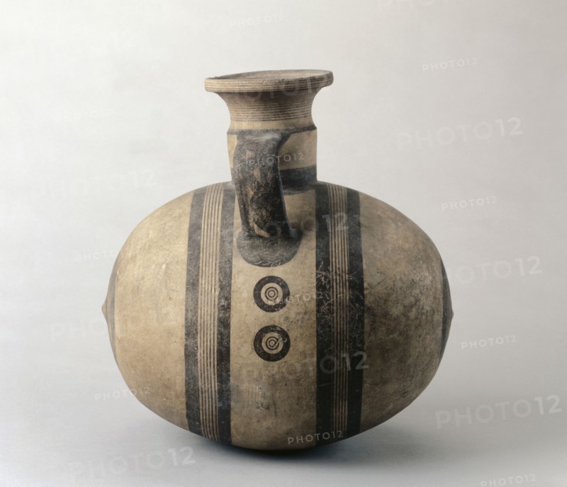 Barrel-Shaped Jug, c. 750-600 BC. Cyprus, Cypro-Archaic I. Ceramic; diameter: 12.8 cm (5 1/16 in.); overall: 38 x 27.6 cm (14 15/16 x 10 7/8 in.).