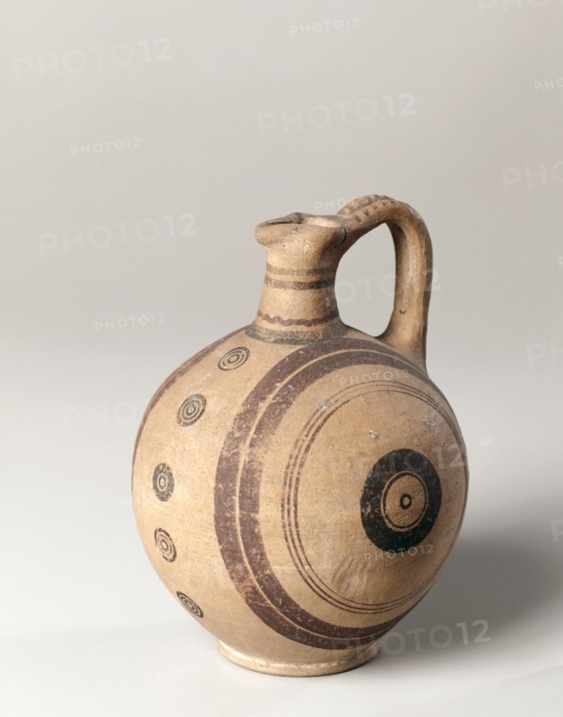 Jug, c. 600-475 BC. Cyprus, Cypro-Archaic II. White painted ware; diameter: 15.5 cm (6 1/8 in.); overall: 21 cm (8 1/4 in.); diameter of foot: 7.7 cm (3 1/16 in.).