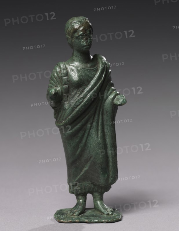 Statuette of Sacrificing Woman, 600-480 BC. Italy, Etruscan, Archaic period. Bronze; overall: 19.1 cm (7 1/2 in.); base: 7.9 cm (3 1/8 in.).