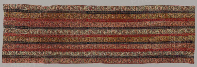 Fragment: Back of a Coat, after 1830. India, Kashmir, 19th century. Twill weave, brocaded; wool; overall: 119.9 x 36.8 cm (47 3/16 x 14 1/2 in.).