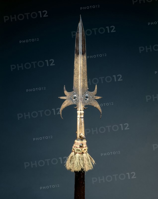 Partisan, 1600s. France, 17th century. Steel, gilt, etched and chiselled; overall: 209.5 cm (82 1/2 in.); blade: 32.4 cm (12 3/4 in.).