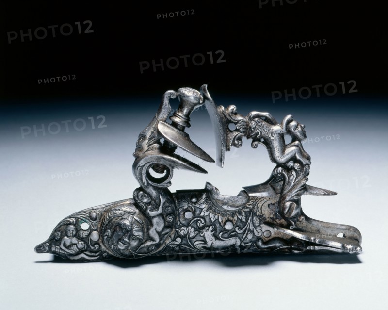Snaphance Gunlock, c.1660-80. Italy, Brescia (?), 17th century. Steel, chiseled; overall: 14 x 7.3 cm (5 1/2 x 2 7/8 in.).