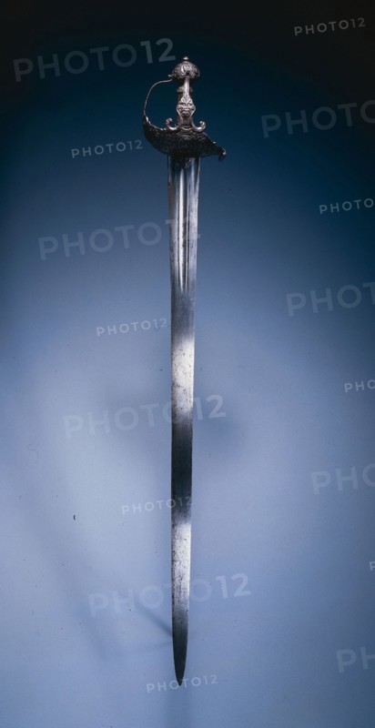 Basket-Hilt Broadsword ("Mortuary Sword"), hilt: c. 1640-1650; blade: 18th Century. Hilt: England; Blade: Germany, Solingen (?), Hilt: 17th Century; Blade: 18th Century. Steel, chiseled; inlaid gilt- silver foil; wood and wire grip; overall: 101.6 cm (40 in.); blade: 85.2 cm (33 9/16 in.); hilt: 13 cm (5 1/8 in.).