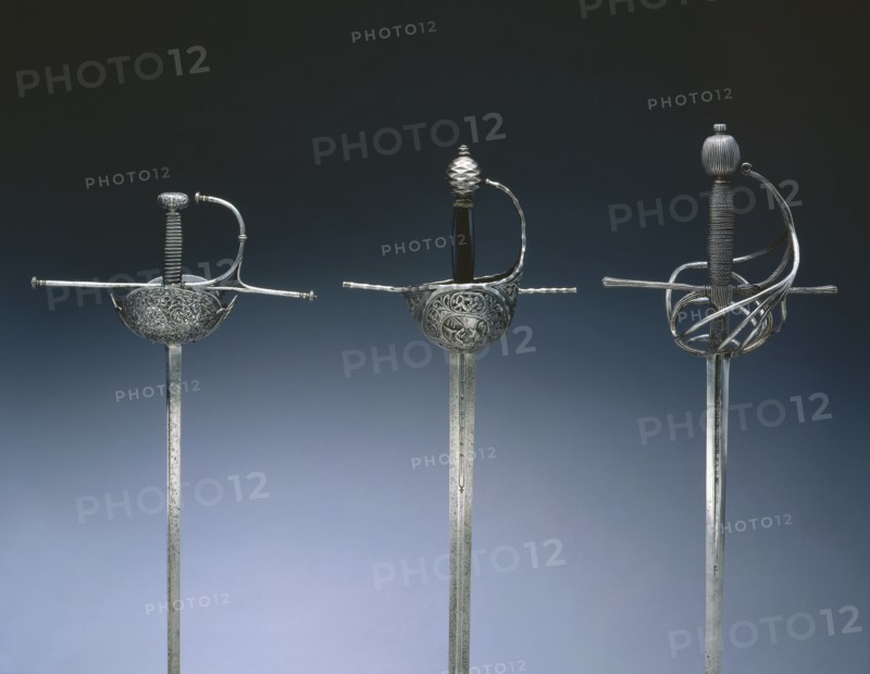Cup-Hilted Rapier, c.1610- 30. Italy, Milan?, 17th century. Steel, pierced, chased and chiseled; wire ferrules on leather-covered wood grip; overall: 123.2 cm (48 1/2 in.); blade: 100.9 cm (39 3/4 in.); quillions: 25.2 cm (9 15/16 in.); grip: 11.8 cm (4 5/8 in.).