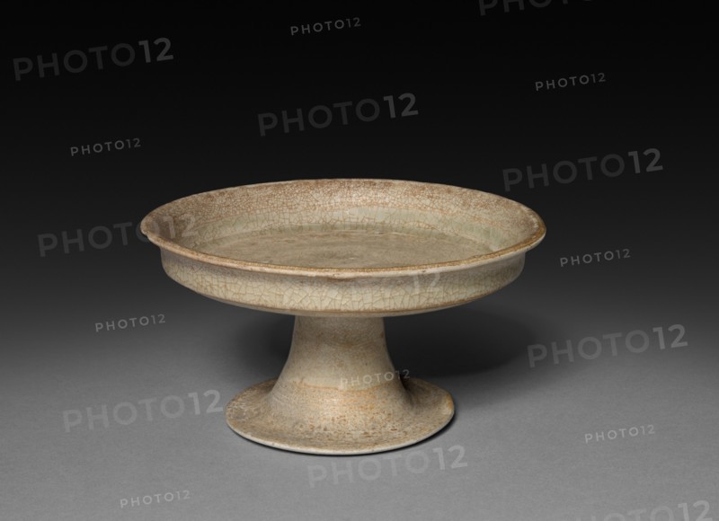 Stem Dish, 7th-8th Century. China, Tang dynasty (618-907). Glazed cream-white stoneware; diameter: 13.2 cm (5 3/16 in.); overall: 9.5 cm (3 3/4 in.).