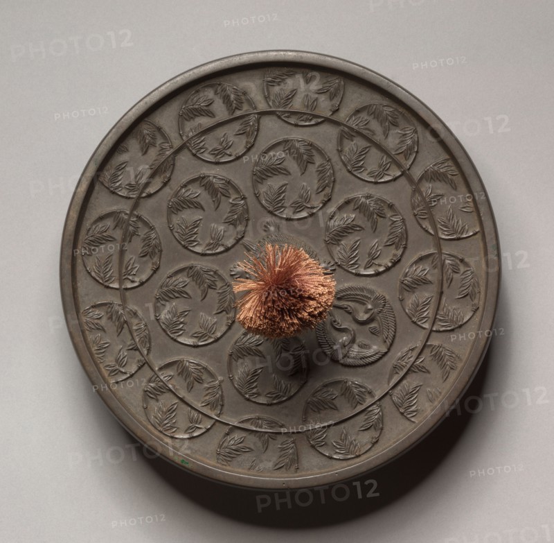 Mirror, 794-1185. Japan, Heian Period (794-1185). Bronze; diameter: 17.8 cm (7 in.).