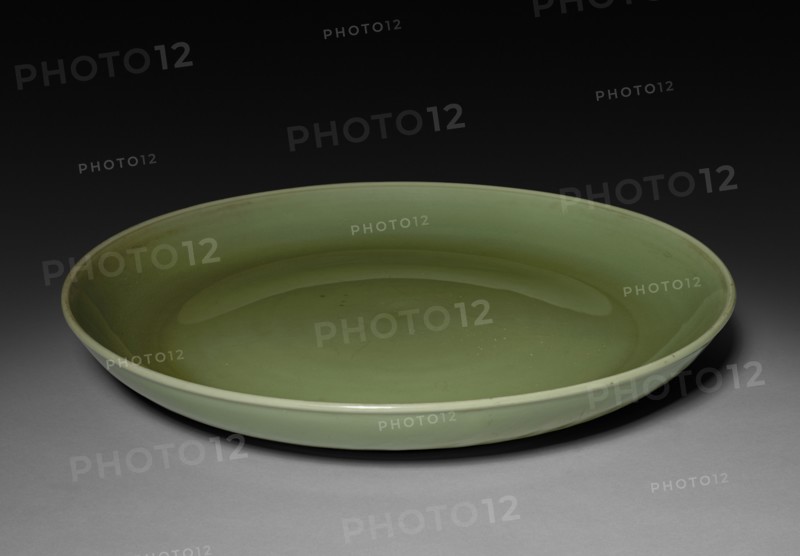 Platter, 1400s. China, Ming dynasty (1368-1644). Porcelain with celadon glaze; diameter: 58.4 cm (23 in.).