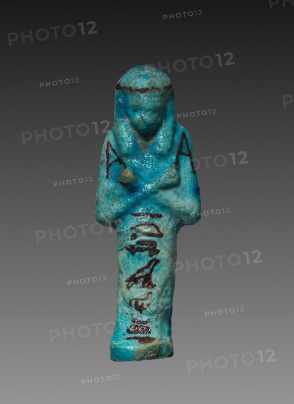 Shawabty, c. 1000-945 BC. Egypt, Third Intermediate Period, probably late Dynasty 21 (1069-945 BC). Turquoise faience with black painted decoration; overall: 8.4 x 3 x 2 cm (3 5/16 x 1 3/16 x 13/16 in.).