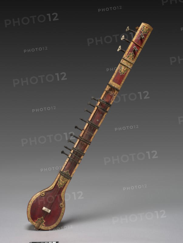 Vina, c. 1850. India, British Period (1858-1947). Painted and gilded wood with ivory veneers and inlay; copper alloy frets; iron alloy strings (with one modern copper replacement); overall: 95.2 x 15.3 cm (37 1/2 x 6 in.).
