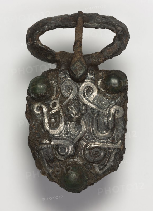 Belt Buckle and Tab, 600s. Frankish, Migration period, 7th century. Iron with silver overlay; overall: 10.2 x 5.9 cm (4 x 2 5/16 in.)