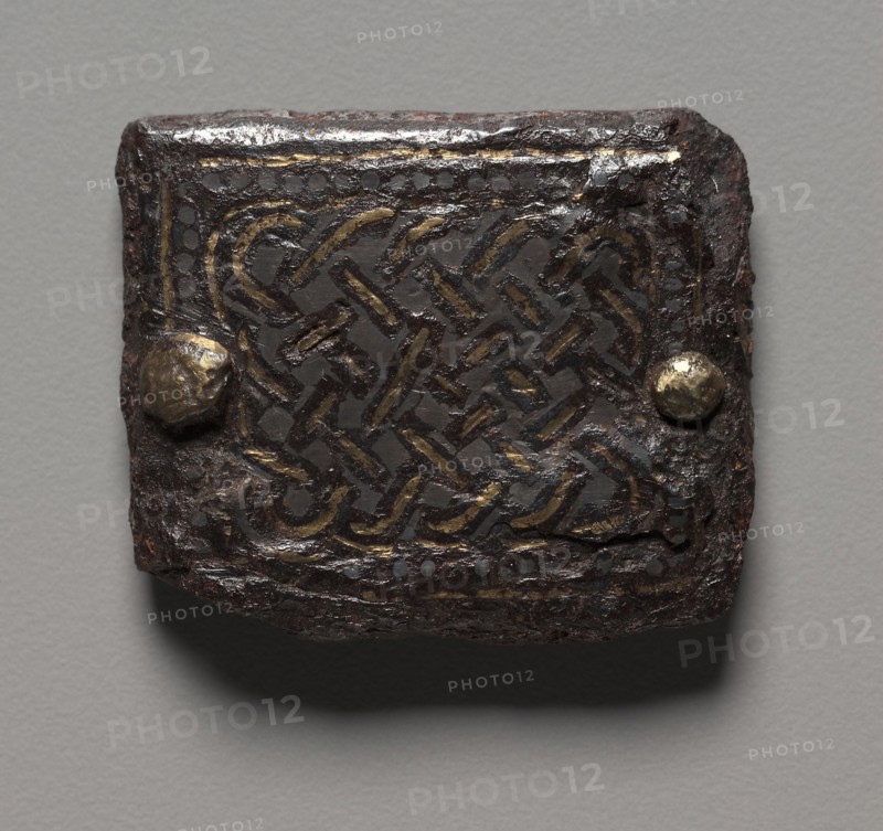 Plaque, 600s. Merovingian, Burgundian, Migration period, 7th century. Iron inlaid with gold and silver; overall: 4.2 x 2.7 cm (1 5/8 x 1 1/16 in.).