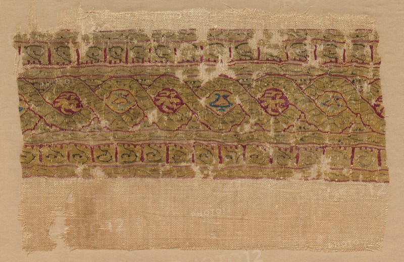 Fragment of a Tiraz-Style Textile, 1130 - 1149. Egypt, Fatimid period, Caliphate of al-Hafiz, AH 524-44 (A.D. 1130 - 1149). Tabby ground with inwoven tapestry ornament; linen and silk; overall: 11.2 x 15.9 cm (4 7/16 x 6 1/4 in.).