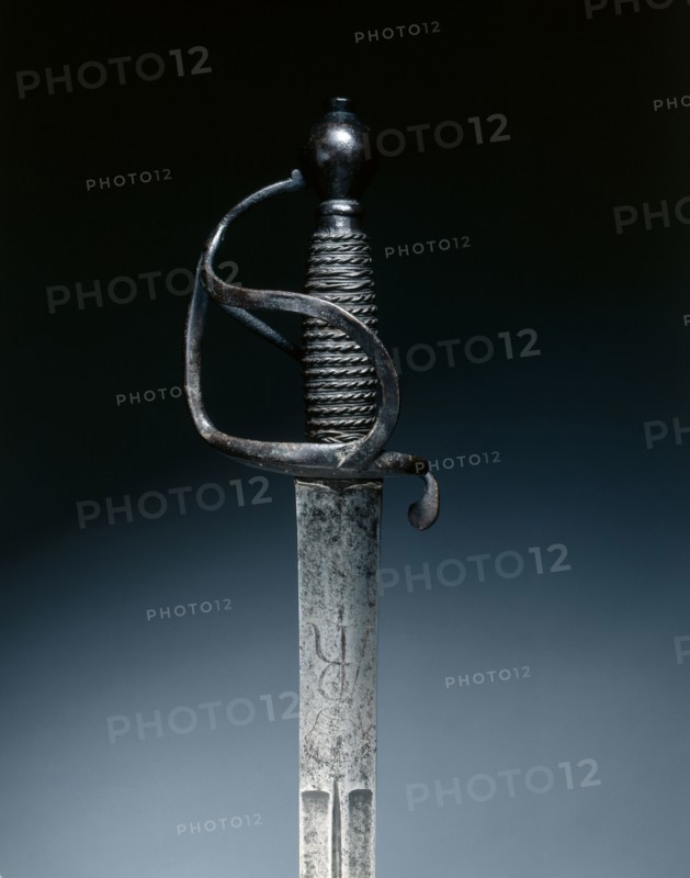 Cavalry Sword, c. 1700-1730. Germany, Saxony, 18th century. Steel (vestiges of blueing and gilding on hilt); wire grip; overall: 105 cm (41 5/16 in.); blade: 105 cm (41 5/16 in.); grip: 14.5 cm (5 11/16 in.); guard: 11 cm (4 5/16 in.).