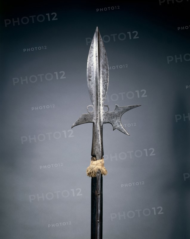 Halberd, c. 1580. Germany, late 16th Century. Steel; leaf-shaped head; octagonal woof haft, woolen pompom; overall: 197.5 cm (77 3/4 in.); blade: 22.8 cm (9 in.)