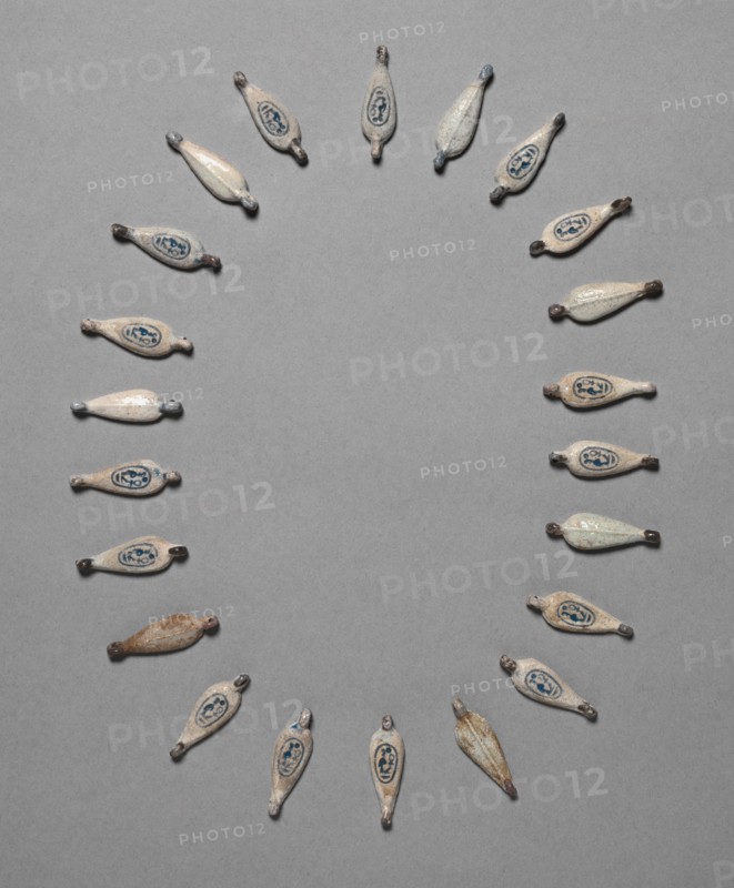 Petal-Shaped Beads, c. 1391-1353 BC. Egypt, New Kingdom, Dynasty 18, reign of Amenhotep III. Faience; overall: 3 x 1 cm (1 3/16 x 3/8 in.).