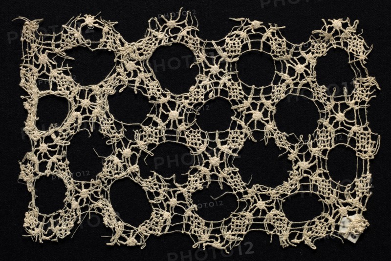 Fragment with Wide Circular Pattern, 16th-17th century. Italy, 16th-17th century. Needle lace, mezza mandolina; bleached linen (est.); overall: 11.4 x 17.5 cm (4 1/2 x 6 7/8 in.)