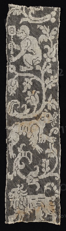 Fragment of a Band with Vines Surrounding a Monkey, Lion, and an Unidentified Four-Legged Animal, 16th century. Italy, 16th century. Needle lace, filet/lacis (knotted ground and darned in two directions); bleached linen (est.); overall: 20.1 x 80.5 cm (7 15/16 x 31 11/16 in.).