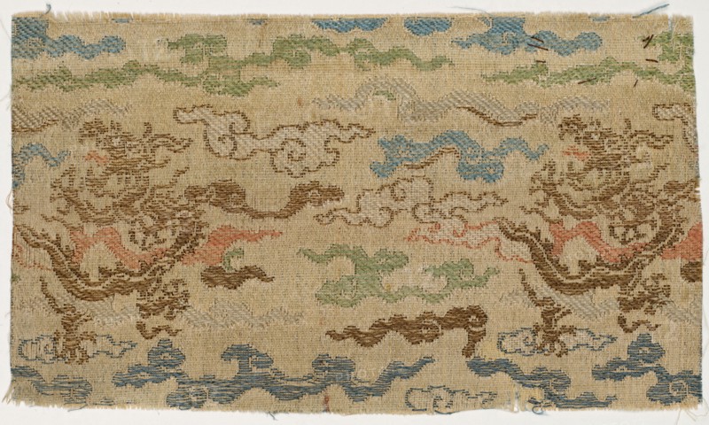 Fragment, 1700s. China, 18th century. Satin ground; silk diasper weave; overall: 13.4 x 7.7 cm (5 1/4 x 3 1/16 in.)
