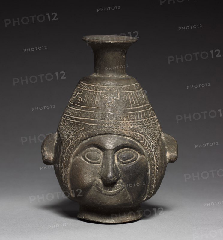 Bottle Vase, c. 1400. Peru, Chimu, late 14th-early 15th Century. Black ware; overall: 18.8 x 14 x 12.2 cm (7 3/8 x 5 1/2 x 4 13/16 in.).
