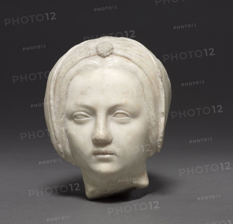 Head of a Woman, c. 1500-1525. Circle of Michel Colombe (French, c. 1430-c. 1513). Marble; overall: 14.6 x 14.6 x 9.3 cm (5 3/4 x 5 3/4 x 3 11/16 in.).