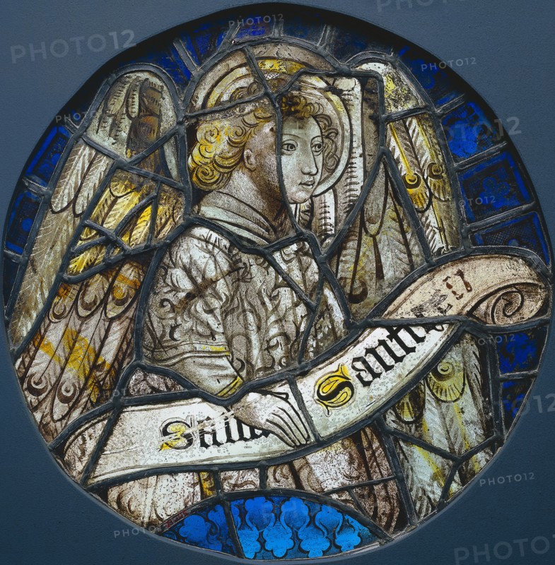 Stained Glass Roundel with an Angel Holding a Scroll, c. 1425-1450. France, 15th century. Stained glass (pot-metal and painted grisaille); diameter: 36.5 cm (14 3/8 in.)