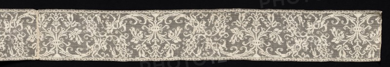 Band with Scroll Pattern, 16th century. Italy, Sicily, 16th century. Needle lace, burato (twined ground and darned in one direction); bleached linen (est.); overall: 14.7 x 388.3 cm (5 13/16 x 152 7/8 in.)