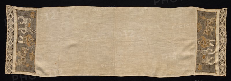 Cloth with Border of Figures of Men and Animals, 18th-19th century. Russia, 18th-19th century. Plain weave linen with needle lace, burato (twined ground and darned in one and two directions) and bobbin lace edging; bleached linen (est.) metallic and colored silk (est.); overall: 48.4 x 154.1 cm (19 1/16 x 60 11/16 in.).