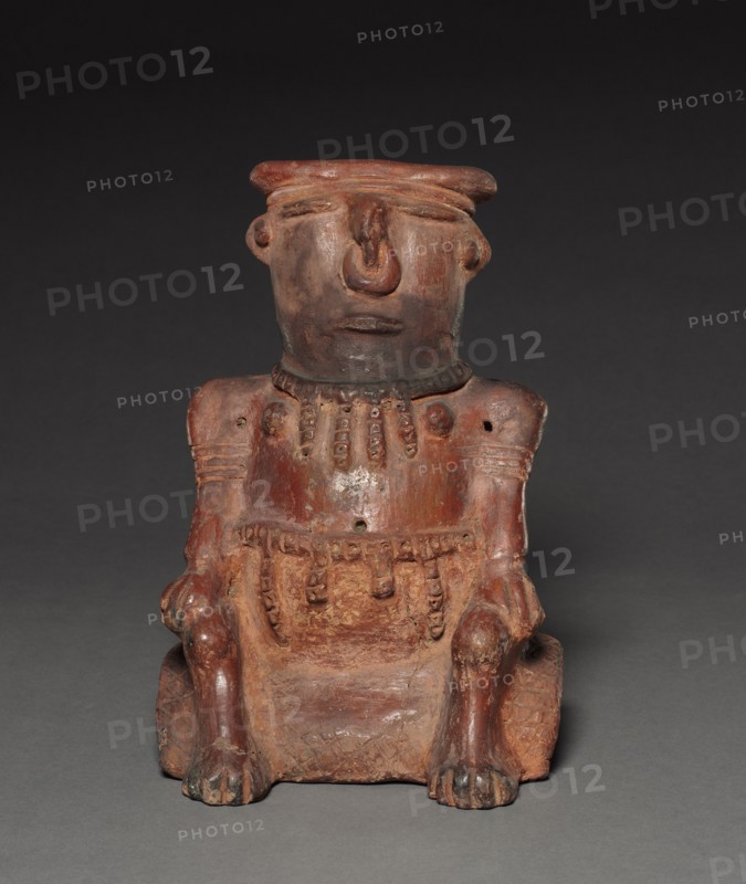 Seated Figure, before 1921. Colombia, 19th-20th century. Red ware; overall: 26.6 x 18.2 x 15.9 cm (10 1/2 x 7 3/16 x 6 1/4 in.).