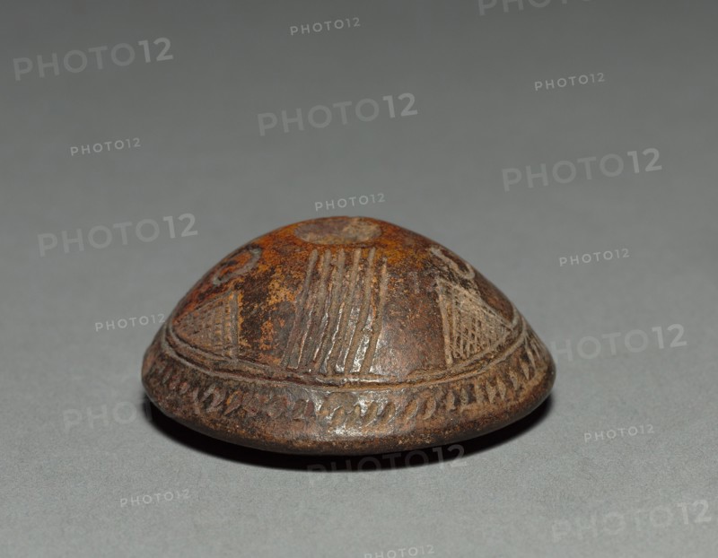 Spinning Whorl, before 1921. Colombia. Red ware; diameter: 5.2 cm (2 1/16 in.); overall: 2 cm (13/16 in.).