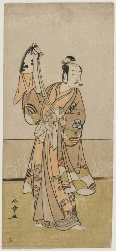 Bando Hikosaburo III Holding a Hand Pupper, mid 1770s. Katsukawa Shunsho (Japanese, 1726-1792). Color woodblock print; sheet: 33 x 15 cm (13 x 5 7/8 in.).