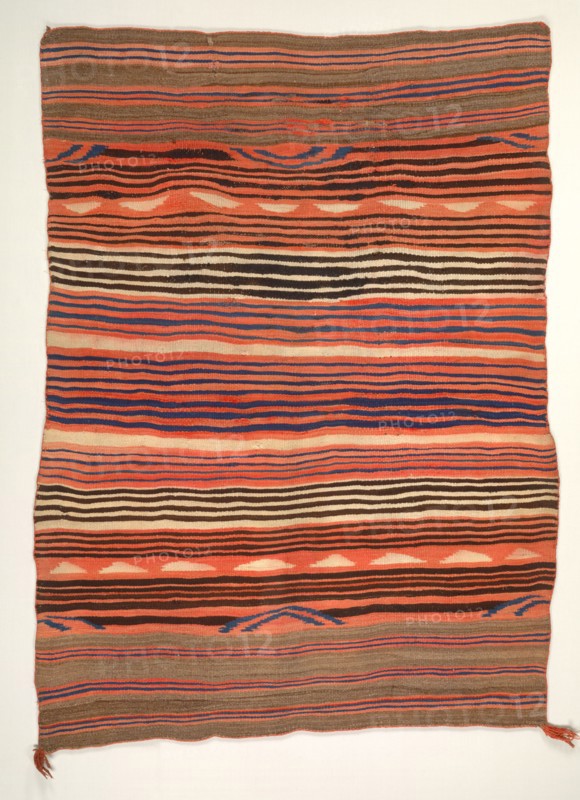 Banded Wearing Blanket (diyugi), c. 1880-1890. America, Native North American, Southwest, Navajo or Pueblo, Post-Contact, Transitional Period. Tapestry weave: wool (handspun and bayeta); overall: 172.7 x 127 cm (68 x 50 in.).