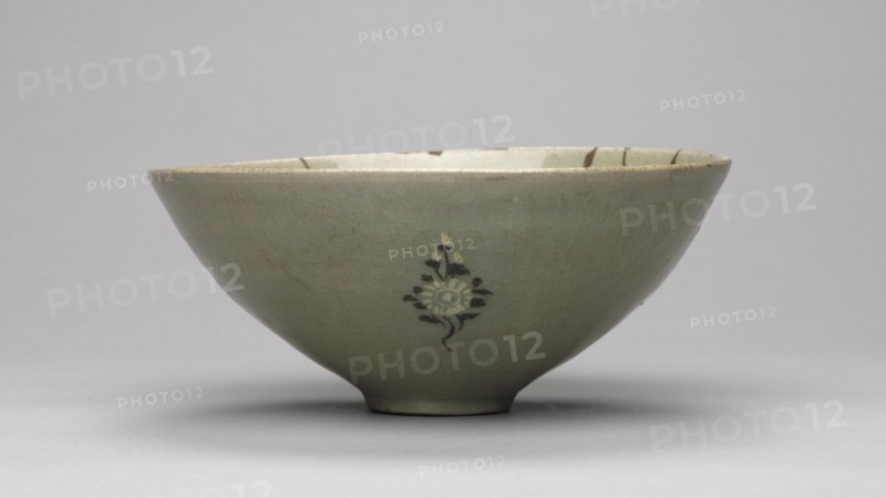 Bowl with Fish and Waves in Relief, 1200s. Korea, Goryeo period (918-1392). Pottery; diameter of base: 3.8 cm (1 1/2 in.); overall: 6.9 x 16.1 cm (2 11/16 x 6 5/16 in.).