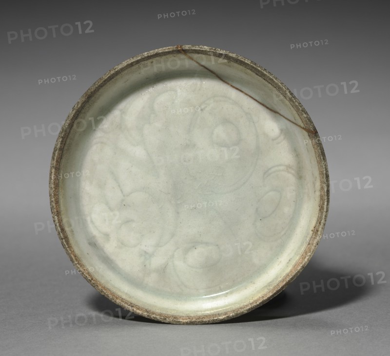 Dish with Incised Scroll Design, 900s-1100s. Korea, Goryeo period (918-1392). Pottery; overall: 1.2 x 9.2 cm (1/2 x 3 5/8 in.); diameter of base: 7 cm (2 3/4 in.).