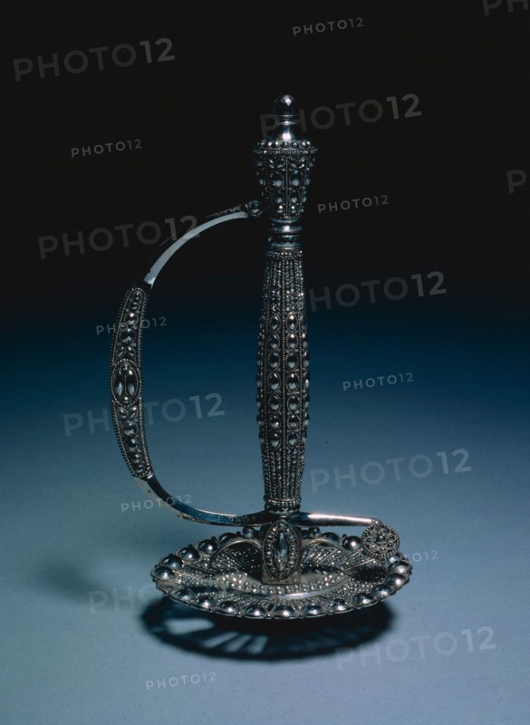 Hilt from a Court Sword, c. 1790-1800. England, late 18th Century. Polished steel, pierced and inset with faceted steel beads; overall: 18.4 cm (7 1/4 in.); guard: 9.7 cm (3 13/16 in.)