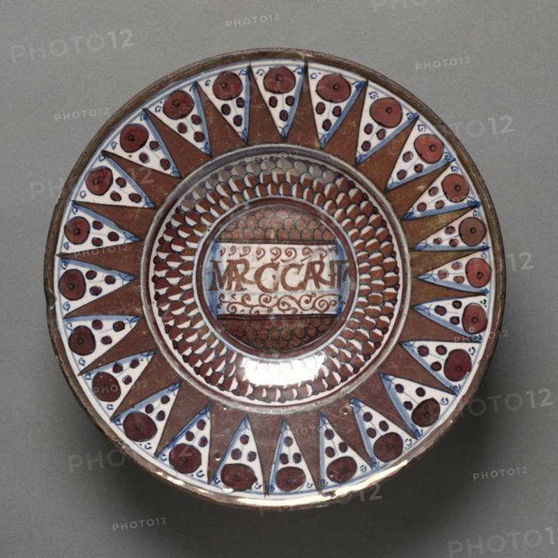 Plate, early 1500s. Italy, early 16th century. Tin-glazed earthenware (maiolica); diameter: 23.2 x 2.9 cm (9 1/8 x 1 1/8 in.).