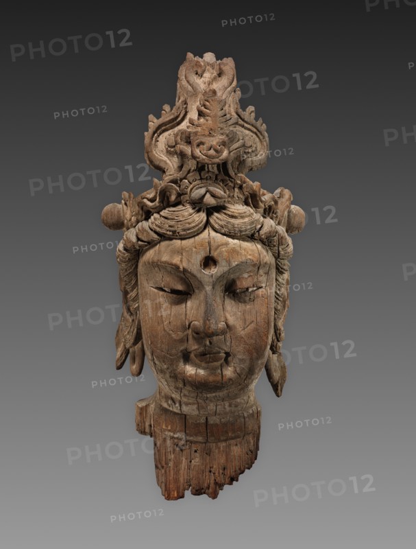 Head of a Bodhisattva, 1100s. China, reportedly from Henan province, Northern Song (960-1127) to Jin dynasty (1115-1234). Wood; overall: 86.4 x 40.6 x 38.1 cm (34 x 16 x 15 in.)