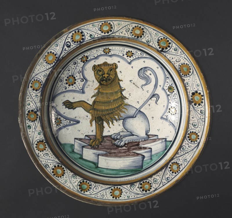 Plate: Lion, late 1400s. Italy, Cafaggiolo, 15th century. Tin-glazed earthenware (maiolica); diameter: 35.6 cm (14 in.); overall: 7.9 cm (3 1/8 in.).