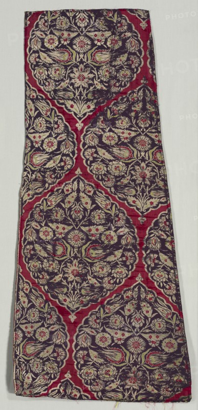 Brocaded silk with foliate medallions from a kaftan, 1525-1575. Turkey, Istanbul, Ottoman period. Lampas: silk and silver-metal thread; overall: 104.7 x 48.3 cm (41 1/4 x 19 in.)